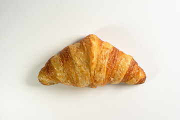 croissant isolated on white top view