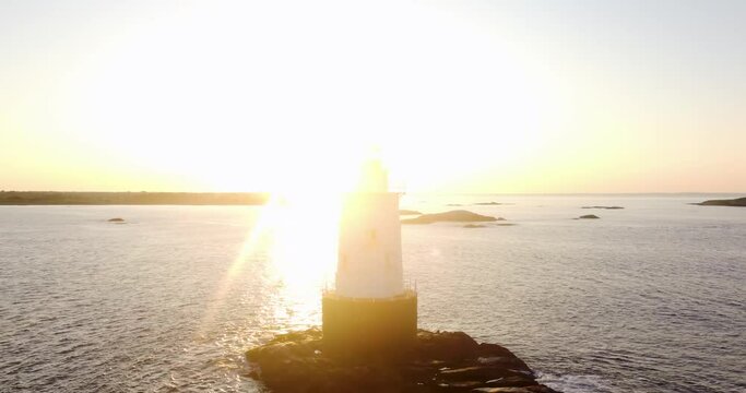 07/10/2022 - Little Compton, RI USA - Early morning video of the Sakonnet Point Light (West Island Light) between Little Compton and Tiverton Rhode Island, at Sakonnet River and Atlantic Ocean.	
