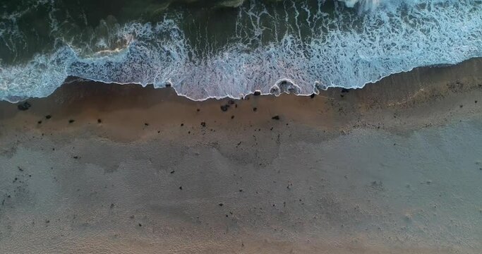 Aerial view flying along Latvian Baltic sea seaside beach coast near Liepaja, Latvia.