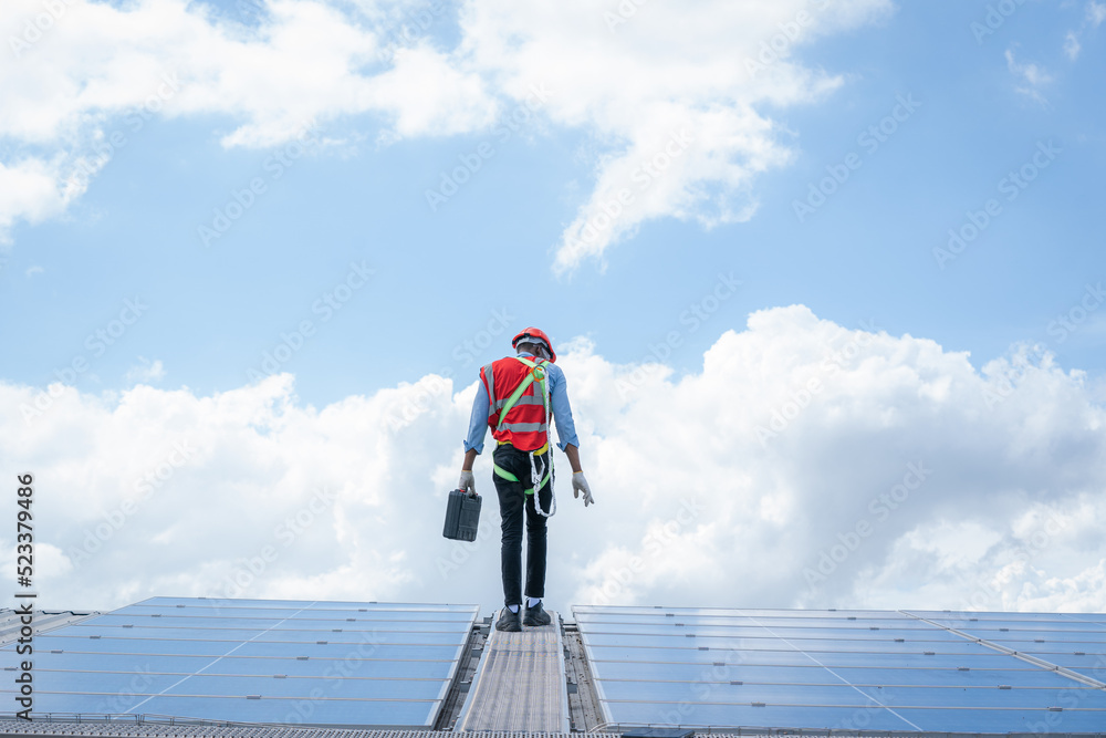 Poster technicians are checking solar panel,engineer service check installation solar cell on the roof of f