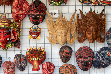 Traditional handicraft puppets mask souvenir retail display in Bali Island, Indonesia