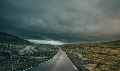 Street leading to nowhere in Norway, summer time. A few hours north from Bergen. Semi wet condition.