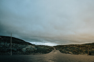 Street leading to nowhere in Norway, summer time. A few hours north from Bergen. Semi wet condition.