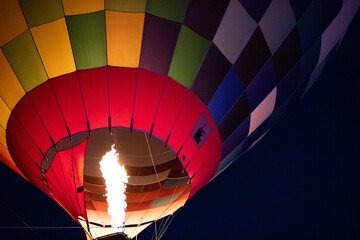 hot air balloons flying at night