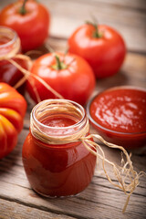A traditional homemade tomato sauce and tomatoes
