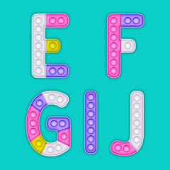 Children's pop it alphabet. A set of realistic antistress toys in the form of an letters.