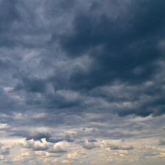 Black storm clouds and bright horizon