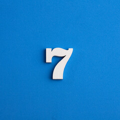 Number 7 in white on blue foami background