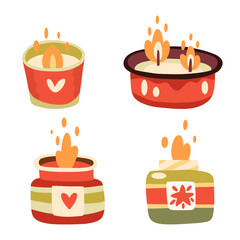 Set of burning candles in jars