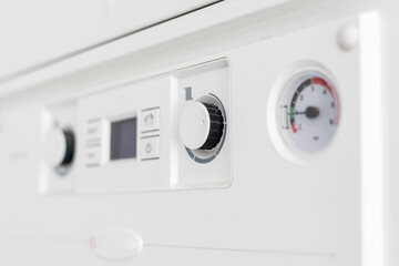 closeup of control panel on modern electric or gas boiler