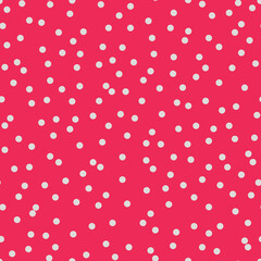 Polka dot seamless pattern. Abstract random flying colorful confetti. Trendy print in red and white colors for fabric, textile, gift wrapping paper, wallpaper. Vector illustration.