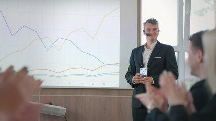 charismatic expert is speaking in professional conference for marketing and management specialists