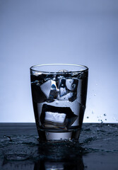 The image of pouring drinking water, into a glass,