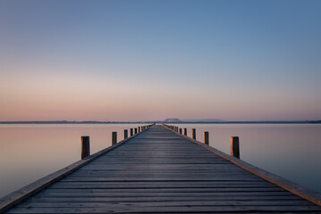 Fototapeta na wymiar pier at sunrise with gorgeous colors