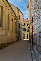 Fototapeta na wymiar Charming side street or alleyway in Skradin Croatia
