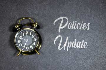 Writing note showing Policies Update. Business photo showcasing act of adding new information or...