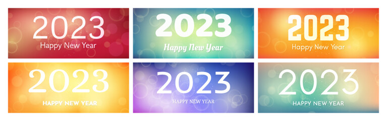 Happy new year 2023 incription on blurred background