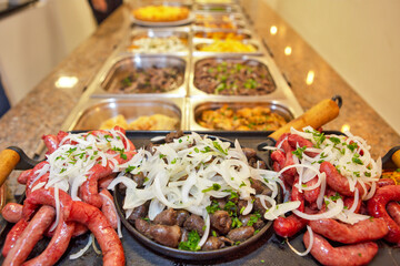 Varied types of food in self service restaurant platters