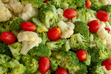 Closeup of broccoli and tomato salad platter