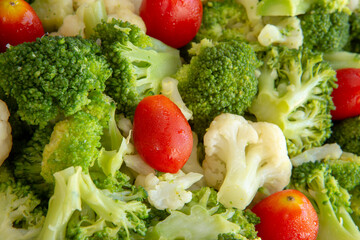 Closeup of broccoli and tomato salad platter