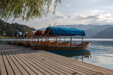 typical wooden boats on Lake Bled