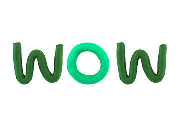 message  wow  Funny plasticine alphabet letters on white background