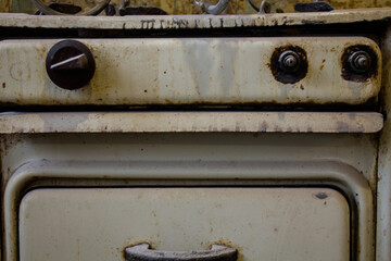 old gas stove. very old technology. vintage furniture. Soviet technology.
