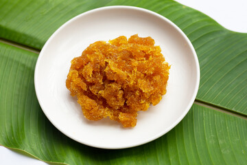 Pineapple paste or jam on white background.