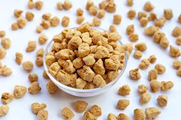 Textured soy protein on white background.