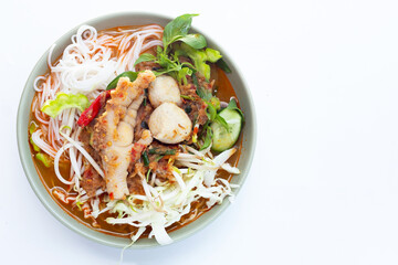 Thai rice noodle with chicken feet curry and fish balls