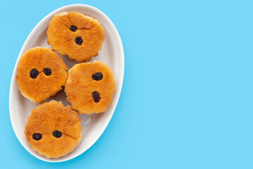 Mini castella cake on blue background.