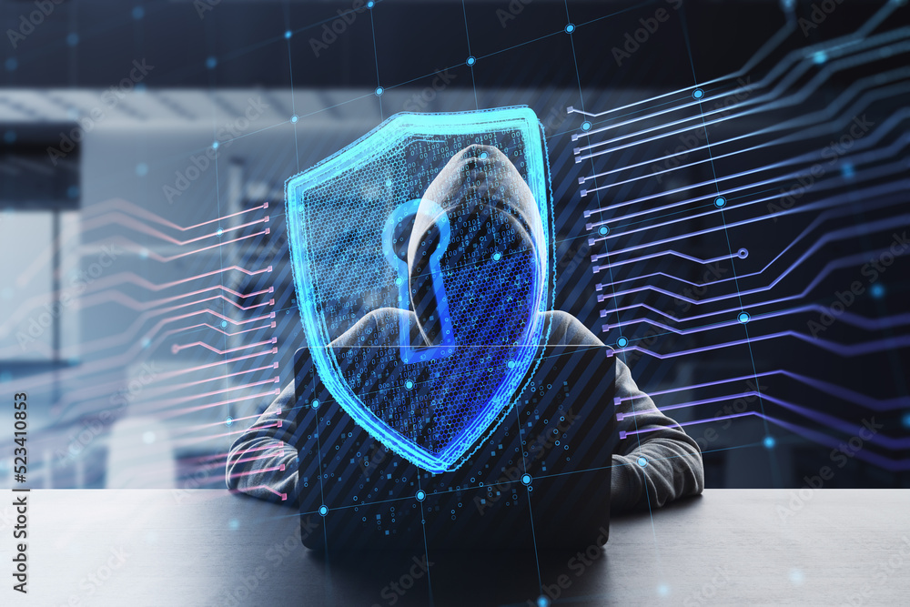 Poster Front view of hacker at desktop using laptop with creative glowing shield circuit security hologram on blurry office interior background. Safety and web protection concept. Double exposure.