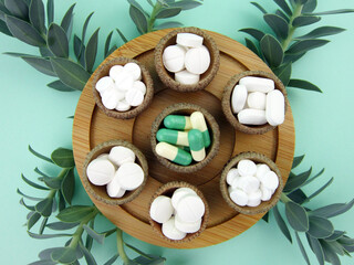       Medicine herb. Herbal pills with healthy medical plant. Green leaf, alternative drug. Natural...