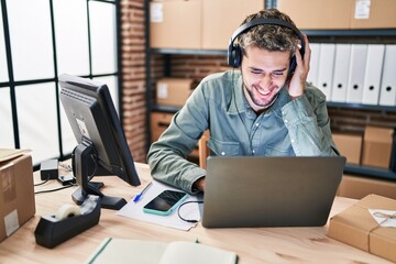 Young man ecommerce business worker having video call at office