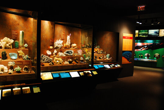 A large display in the Bruce Museum, a natural history and science museum in Greenwich Connecticut, showcases different gems and minerals for guests