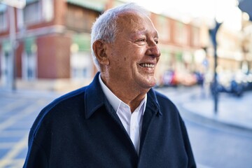 Senior man smiling confident standing at street
