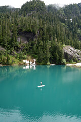 Paddleboarding on a calm glacial lake