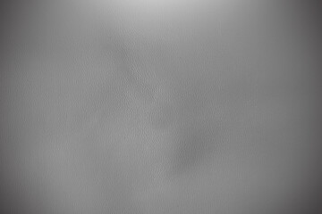 Silver-grey leather background with space.