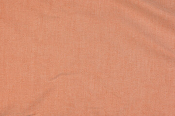 Pale pinkish orange fabric is perfect for backgrounds