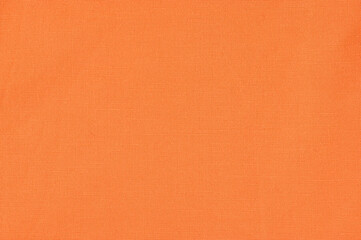 Against the background of orange fabric