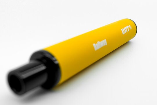 Modern electronic cigarette Railway URT on a white background. Fashionable smoking device. E-cigarette for vaping. Trendy vape pod. Selective focus