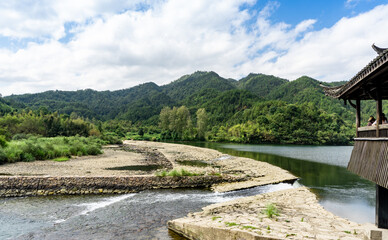 Tongji weir, Lishui, Zhejiang, China, is an ancient water conservancy project in China. It has a...
