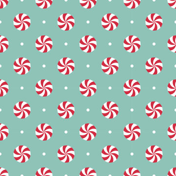 Seamless pattern with peppermint candies. Red and white mint candies on mint green background.