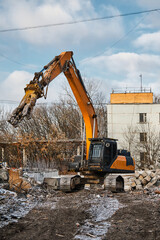 Excavator with hydraulic scissors