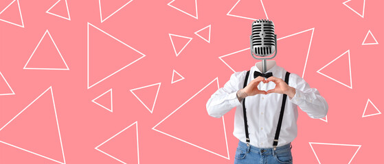 Singer with microphone instead of his head on pink background