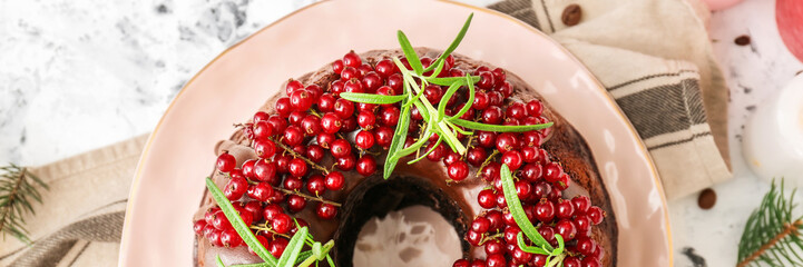 Tasty Christmas cake with berries on light table, top view