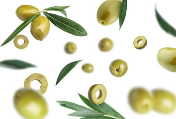Falling green olives on white background