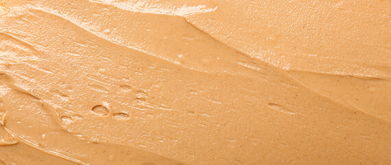 Texture of nut butter as background, closeup