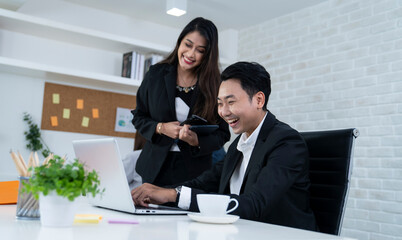asian business couple at office