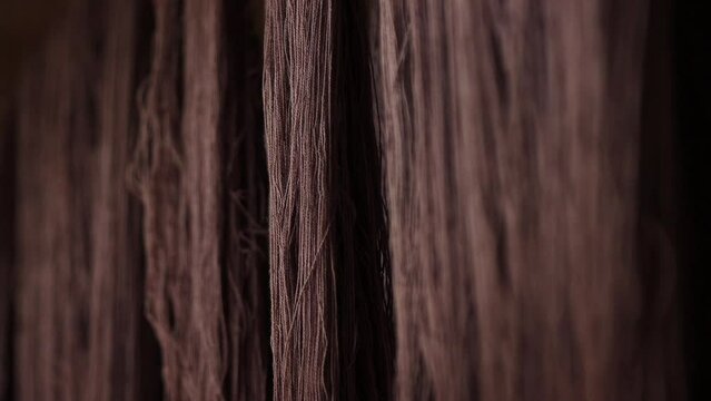 Natural dyeing of cotton from tree bark give muddy yarn To be used as textiles, garments, apparel, fashion. This is a home-made, handcrafted, organic production from indigenous cultures in Asia, Thail